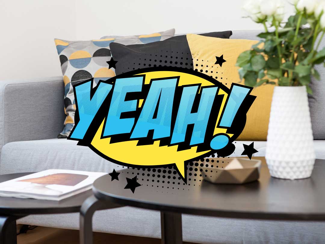 Photo of a perfectly clean yellow and grey sofa, for the blog post, why is it important to have your upholstery professionally cleaned?
